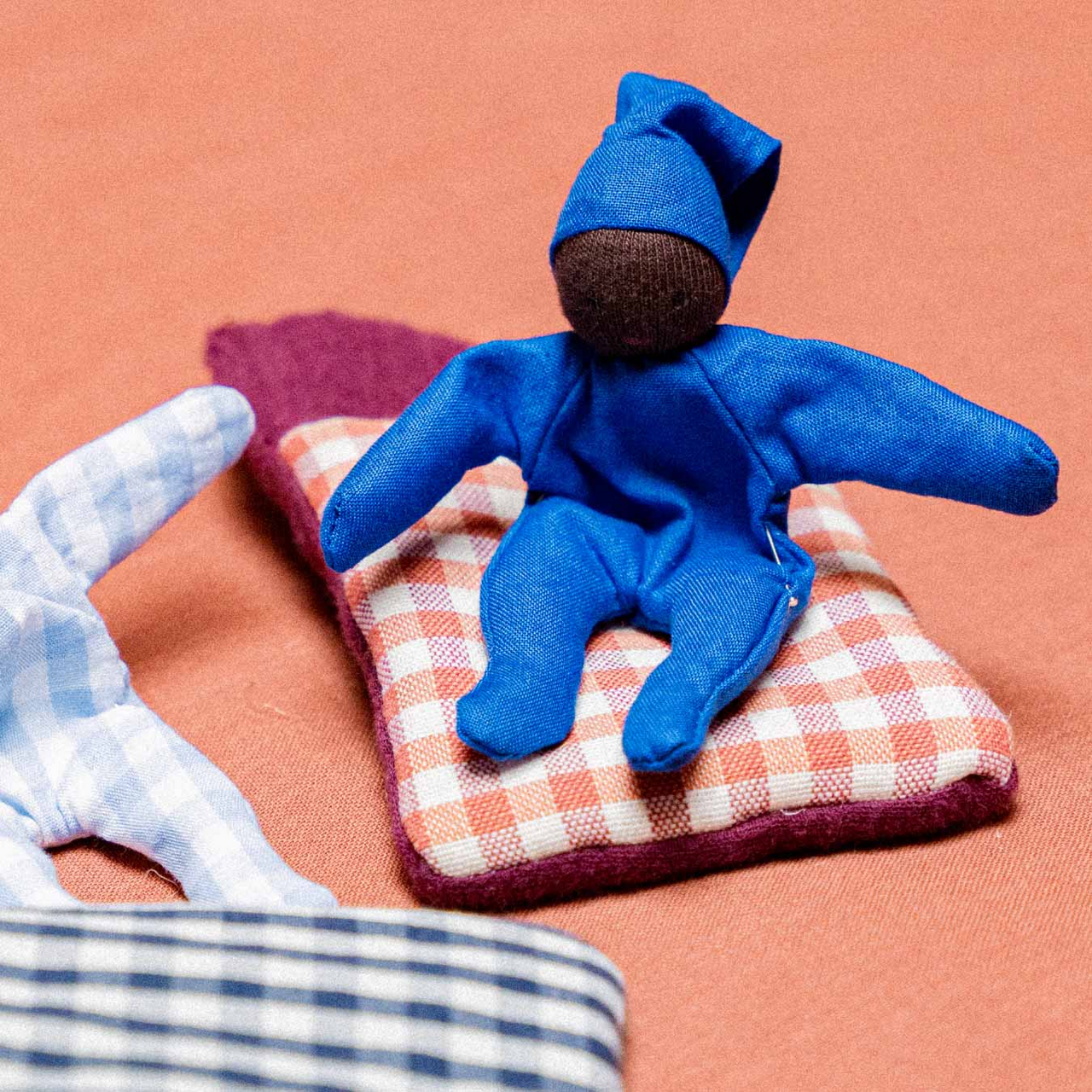 BABY mit Schlafsack karo rot